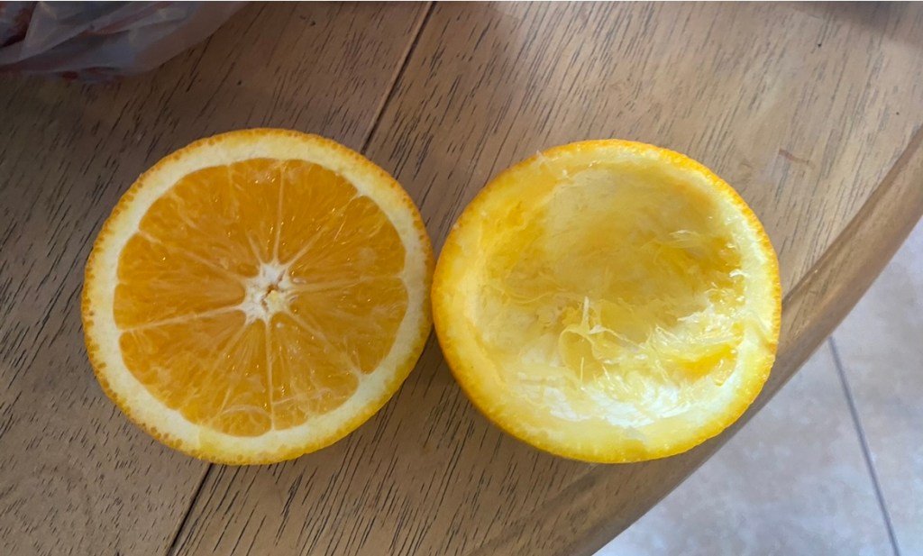 An orange sliced in half
