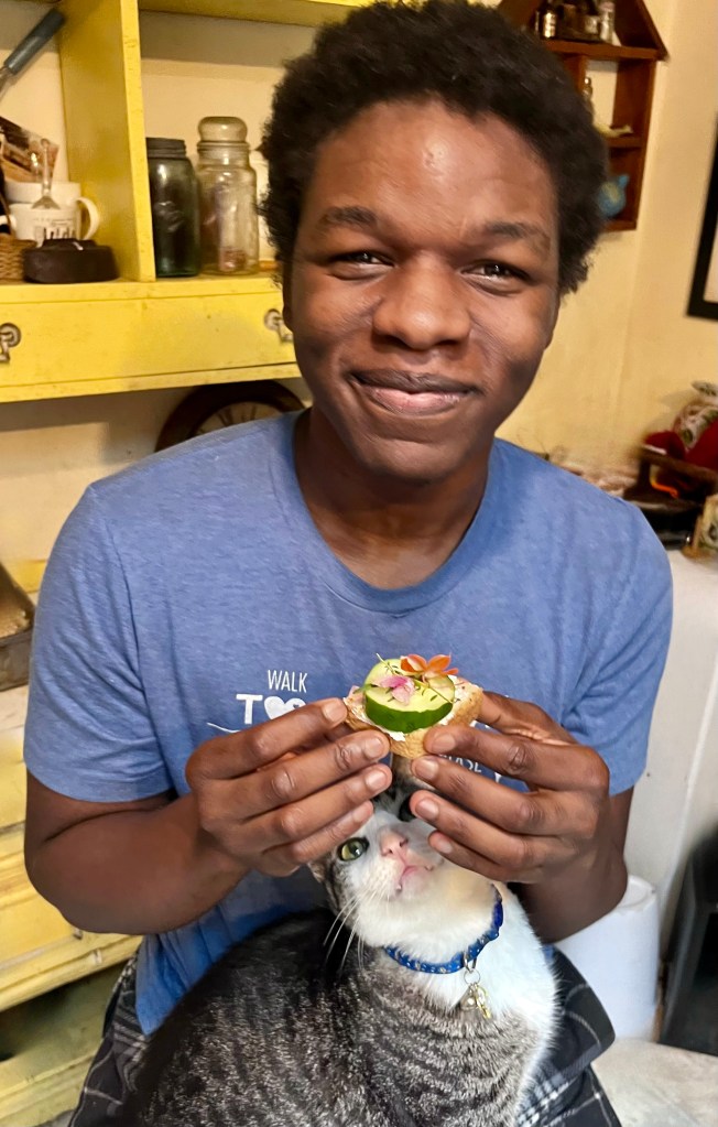 Young man eating a snack